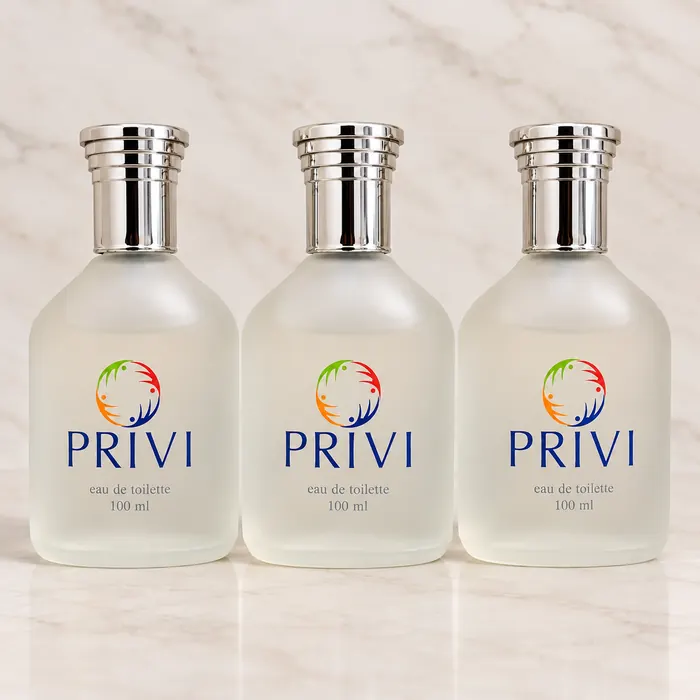 Three frosted perfume bottles screen printed with the Privi logo